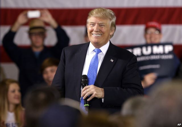 Republican presidential candidate Donald Trump smiles as he speaks at a campaign stop Tuesday, March 29, 2016.